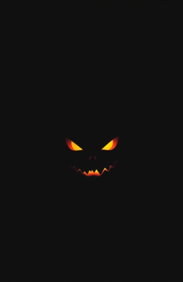 Pumpkin with Glowing Eyes in Dark